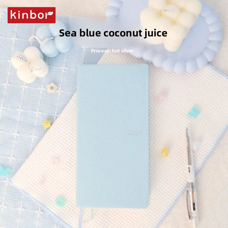 Slim weekly pocket planner with ribbon markers and note sections