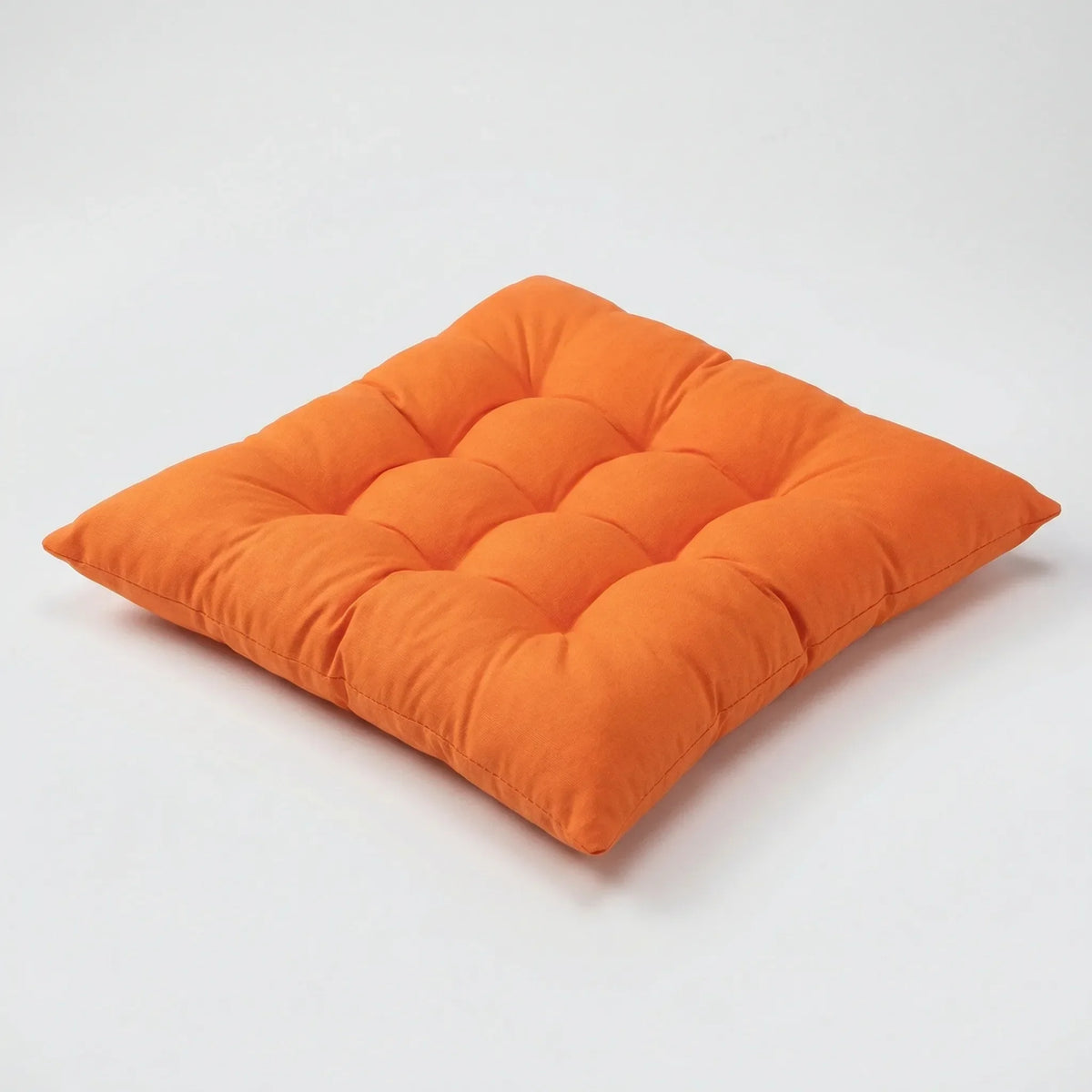 Thick tufted seat pad with corner ties for dining and office chairs