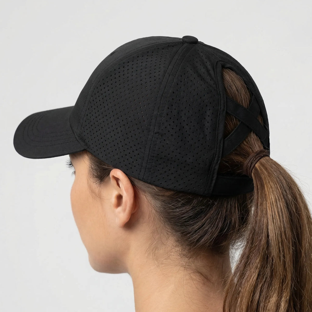 Women's sports cap with ponytail opening and duck bill peak