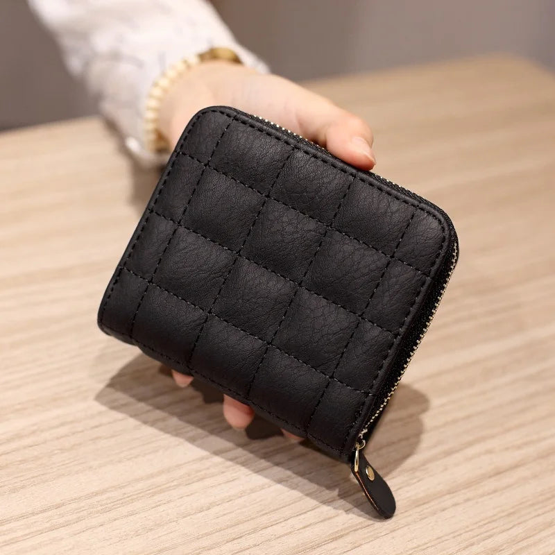 Compact quilted zip wallet with multiple card slots and coin pocket