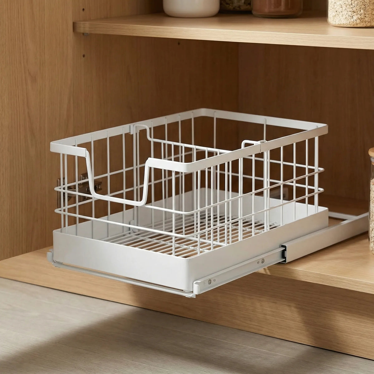 Pull-out under-cabinet organiser with adjustable dividers for pots and lids