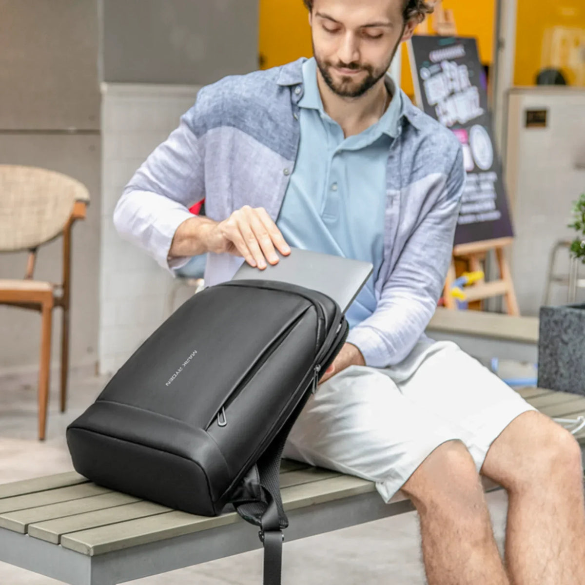 Slim business laptop backpack with padded compartment and organisers