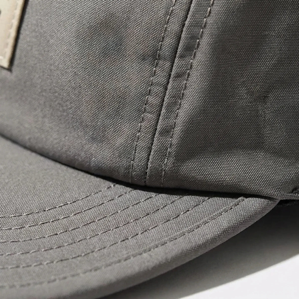 Five-panel short flat brim cap with foldable design and adjustable strap