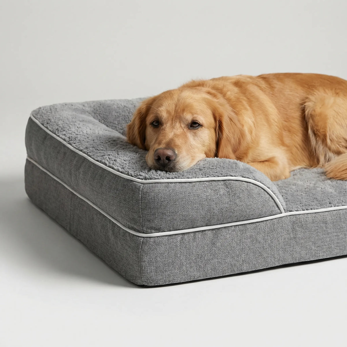 Orthopaedic sofa-style dog bed with supportive foam and washable cover