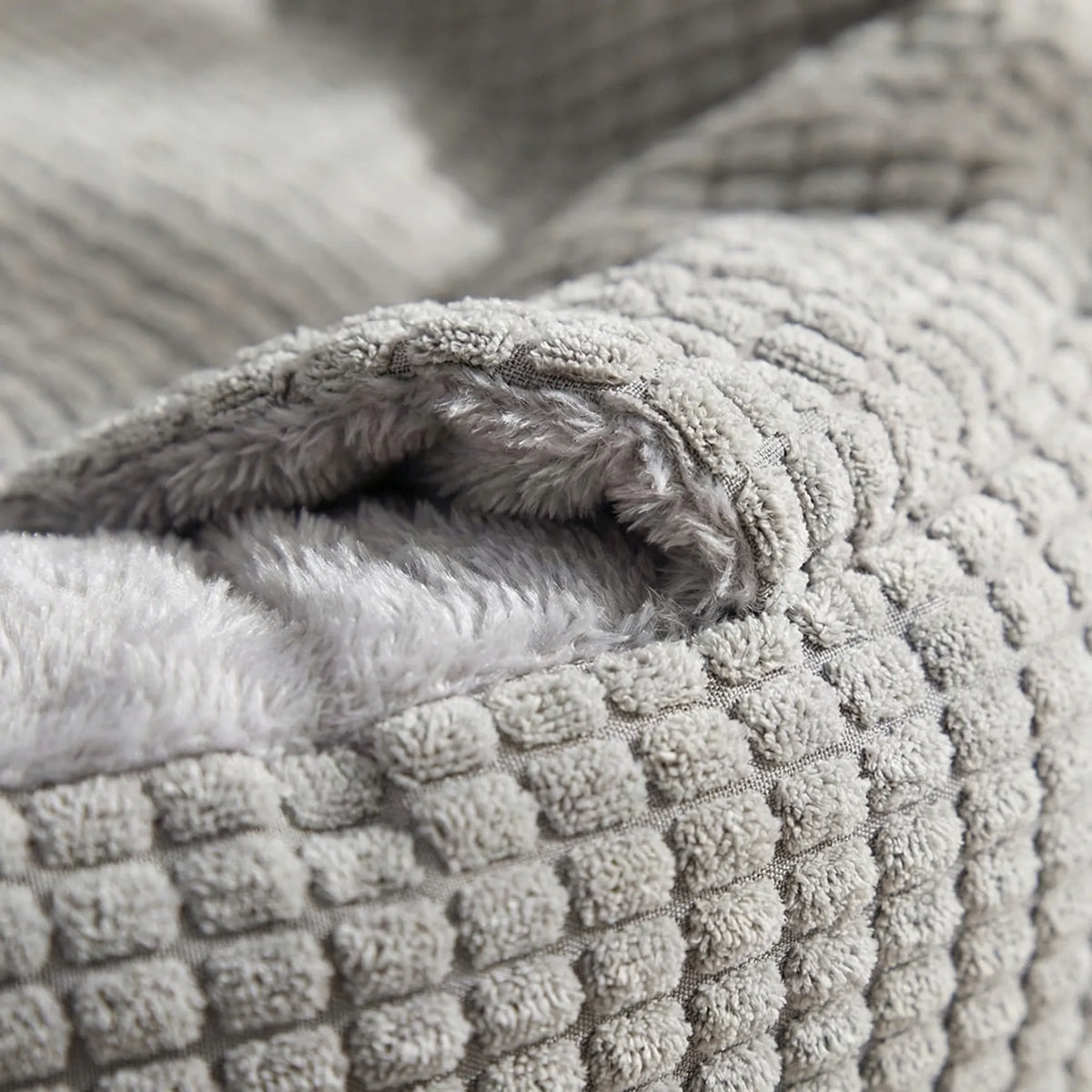 Round hooded donut pet bed with non-slip base and fluffy lining