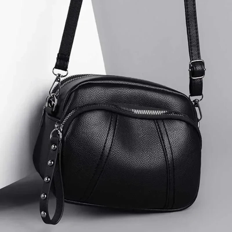 Small pebble leather crossbody bag with adjustable strap