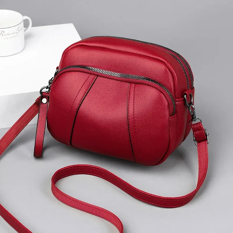 Small pebble leather crossbody bag with adjustable strap