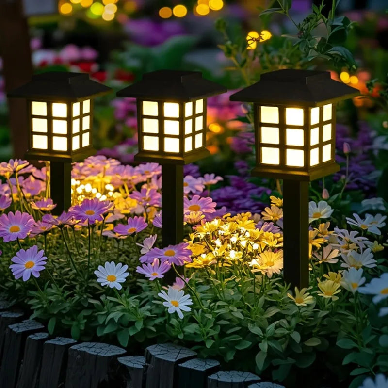 Solar-powered pathway lantern with warm amber glow and pagoda-style design