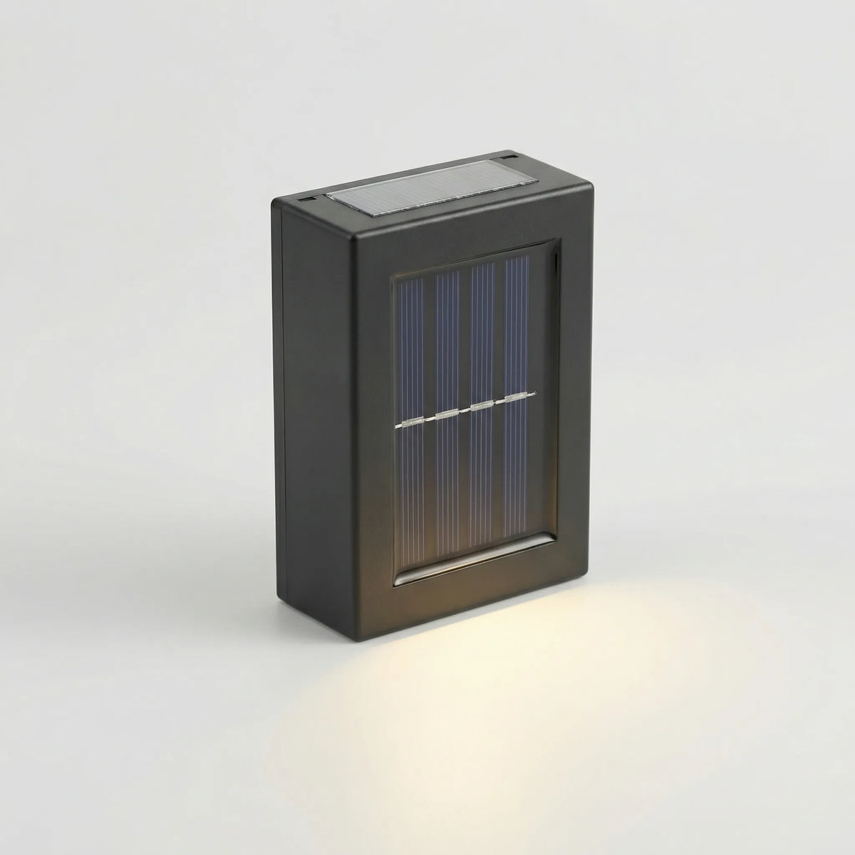 Solar powered up-down wall light with dual beam warm glow