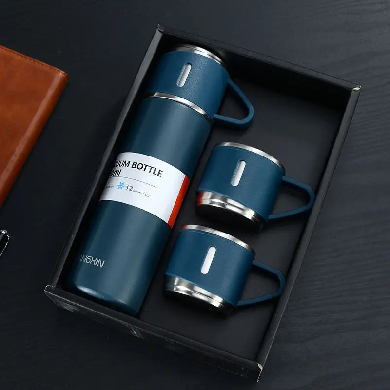 Stainless steel vacuum insulated bottle with matching mugs for travel