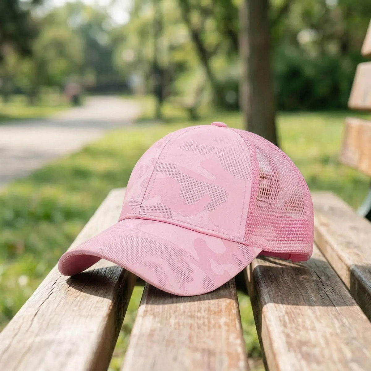 Women's ponytail baseball cap with breathable open back design and curved peak