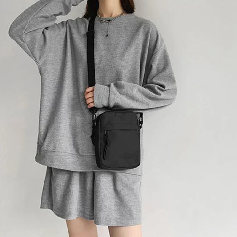 Unisex nylon crossbody bag with adjustable shoulder strap