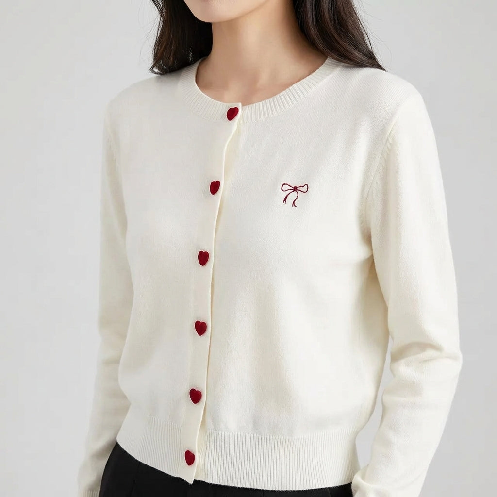 Women's cardigan with heart-shaped buttons and embroidered bow detail