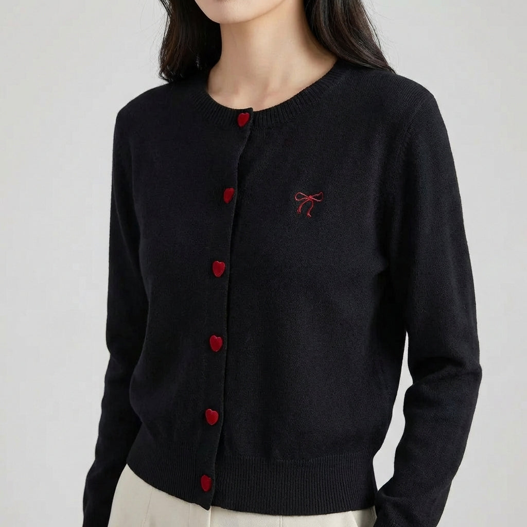 Women's cardigan with heart-shaped buttons and embroidered bow detail