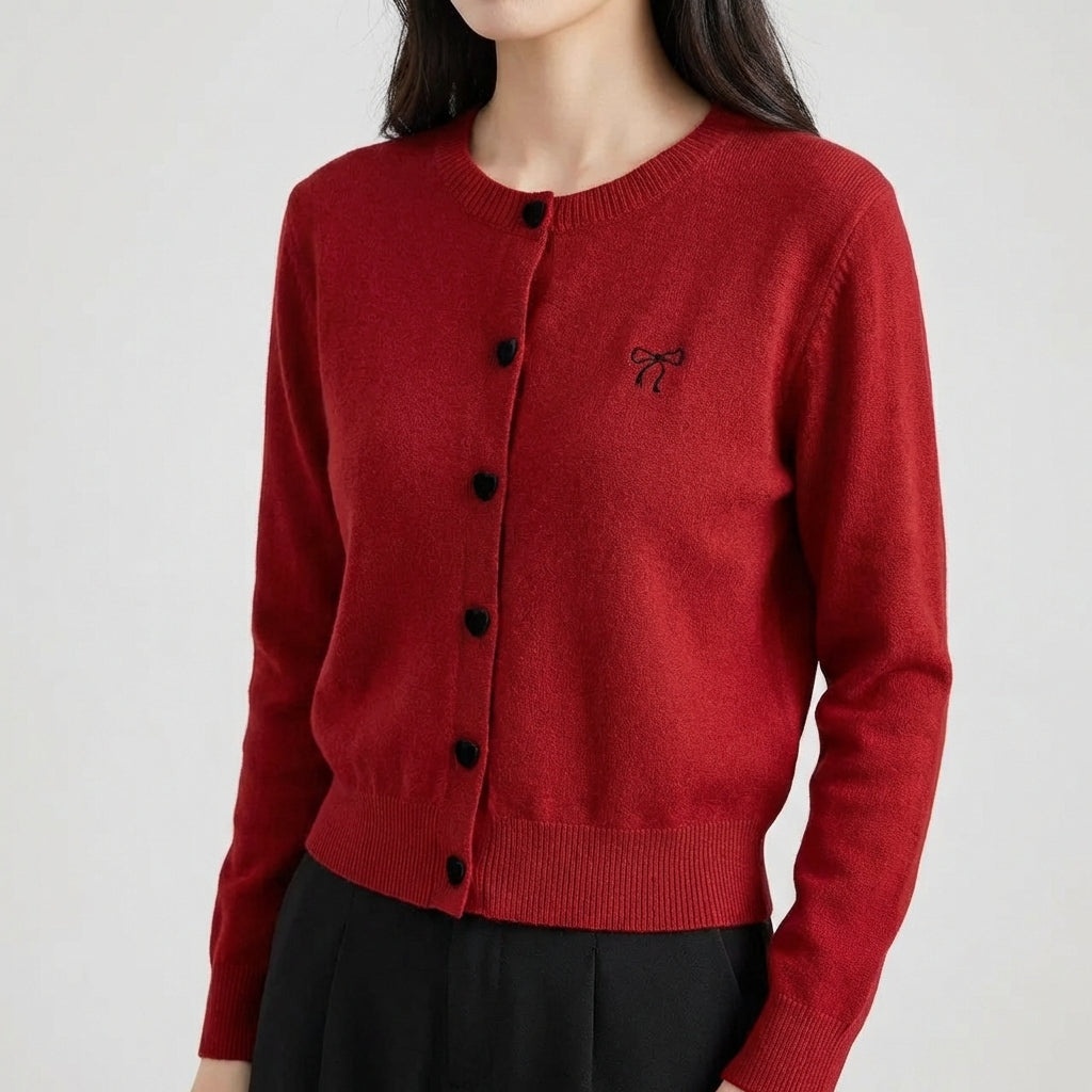 Women's cardigan with heart-shaped buttons and embroidered bow detail