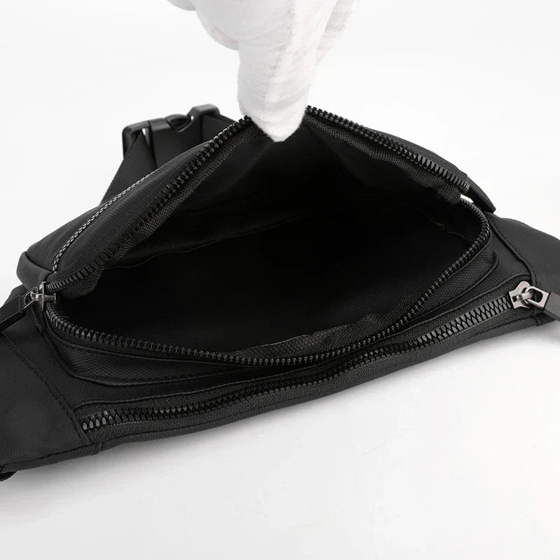 Compact nylon waist bag with multiple compartments and adjustable strap