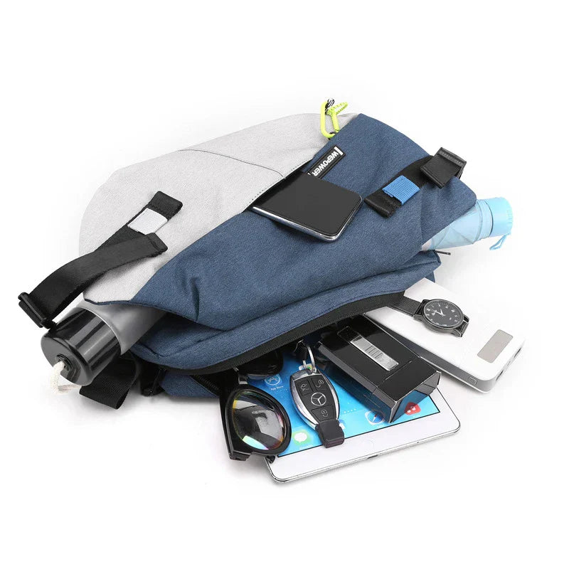 Unisex nylon crossbody bag with adjustable strap and organised compartments