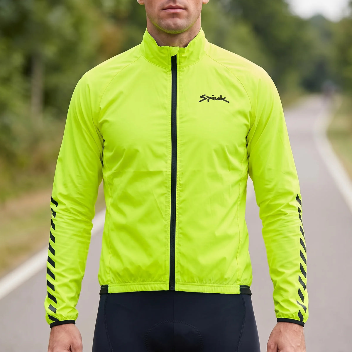 Lightweight cycling windbreaker with water-repellent finish and athletic fit