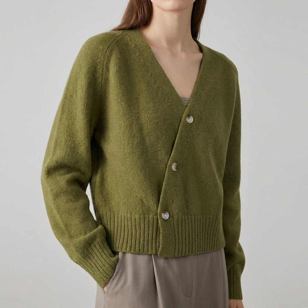 Asymmetric V neck cardigan with skew button front and ribbed hem