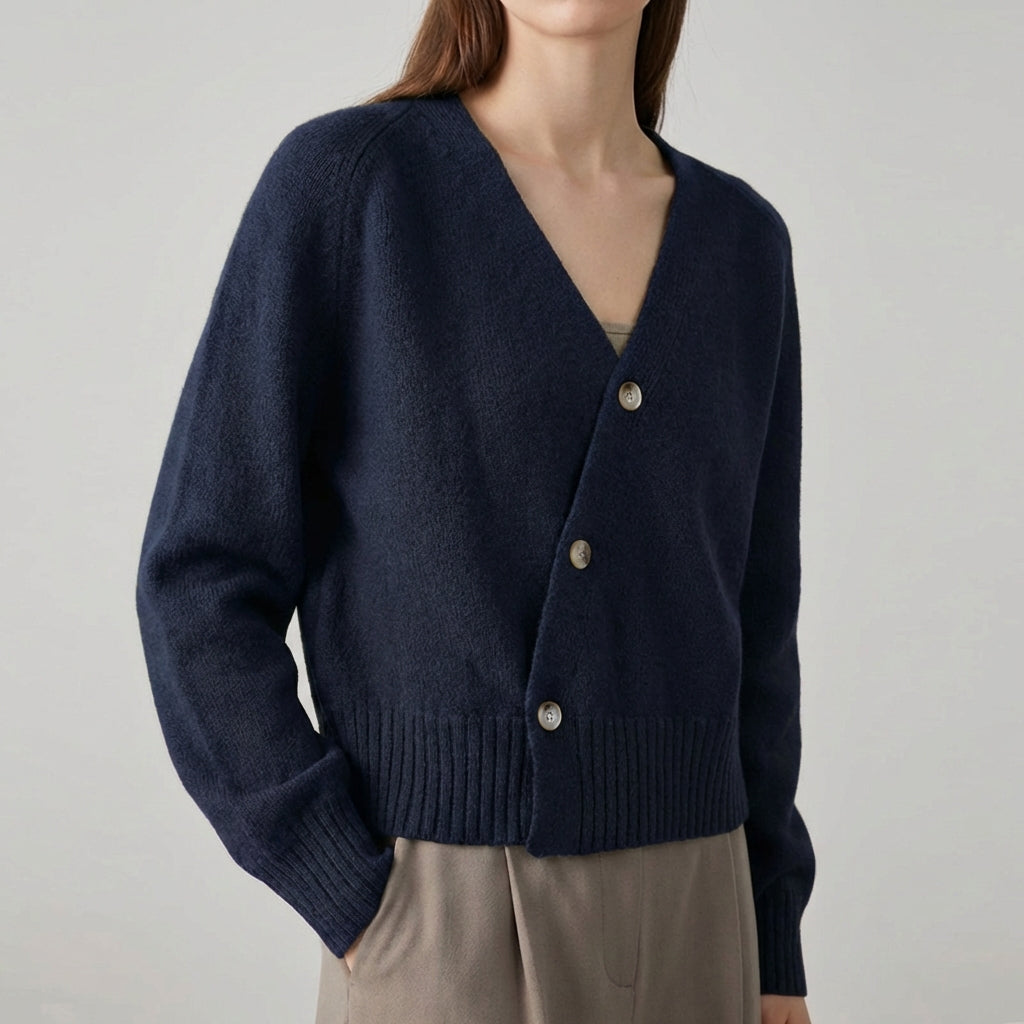 Asymmetric V neck cardigan with skew button front and ribbed hem