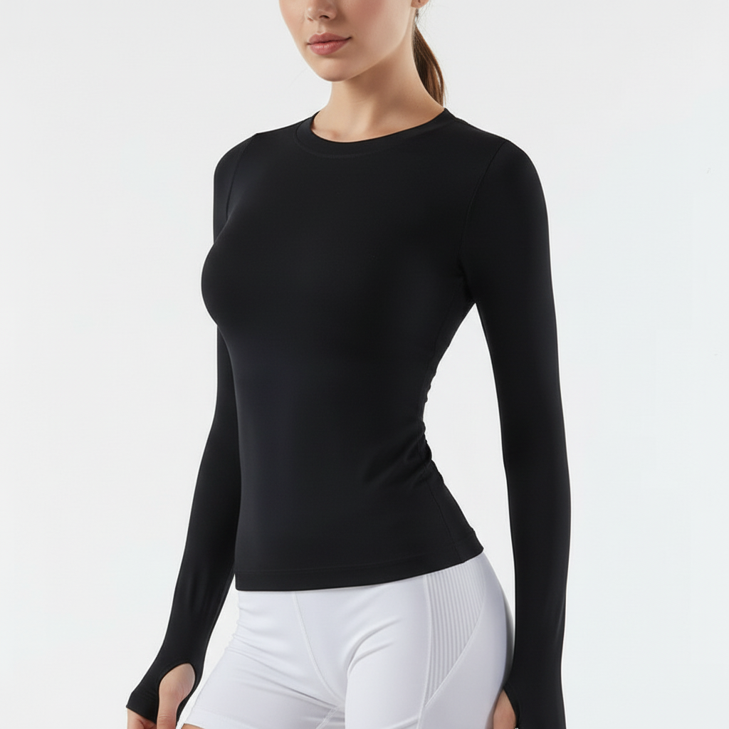 Long sleeve athletic top with seamless construction and thumb cuffs
