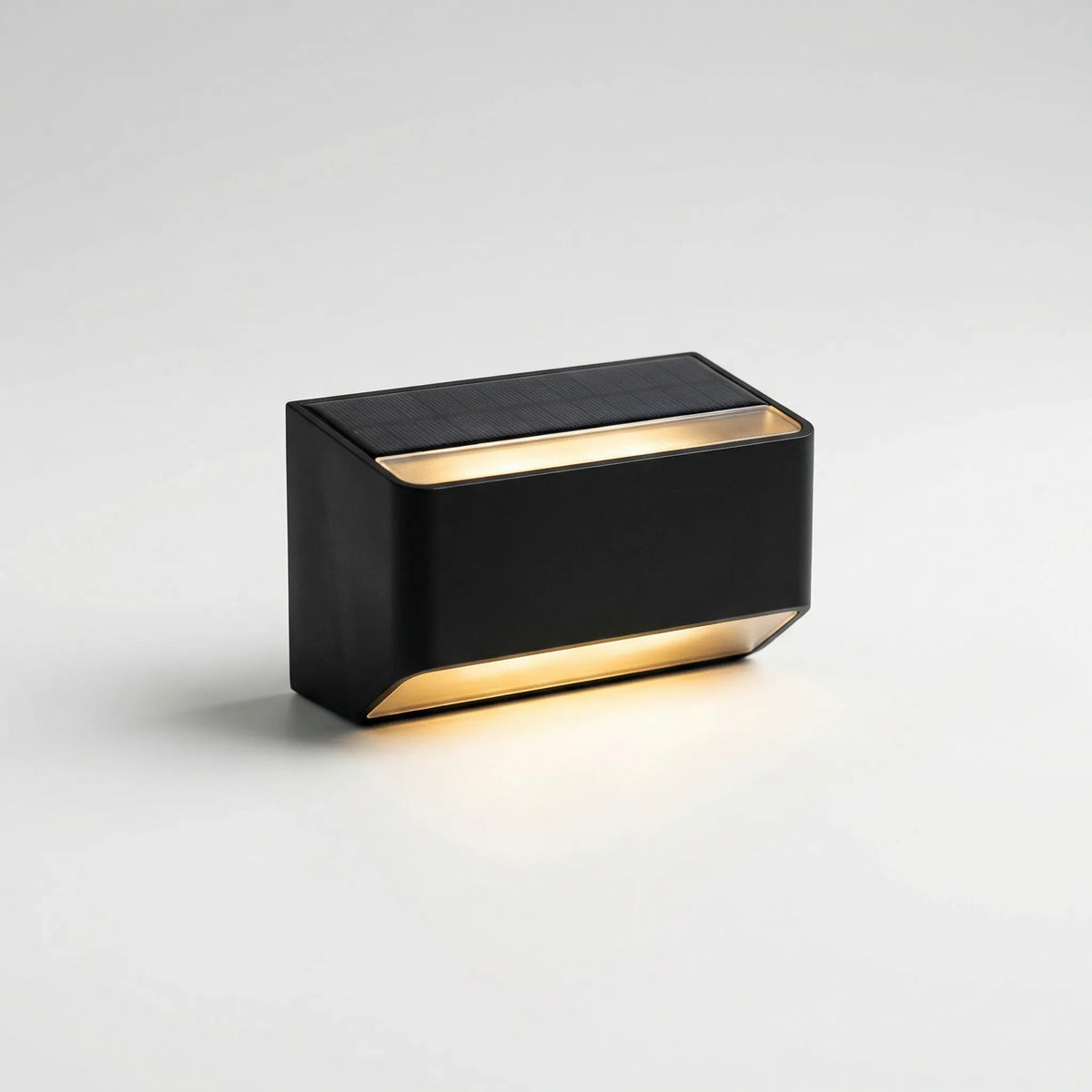 Solar-powered outdoor wall light with dual up-and-down warm glow