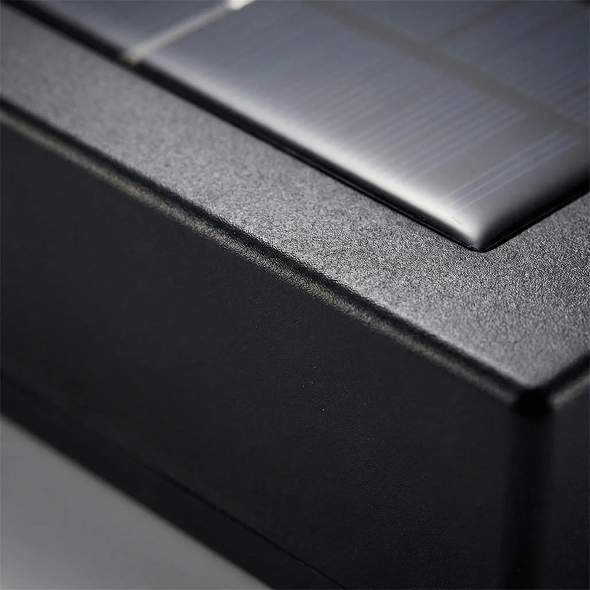 Solar-powered outdoor wall light with dual up-and-down warm glow