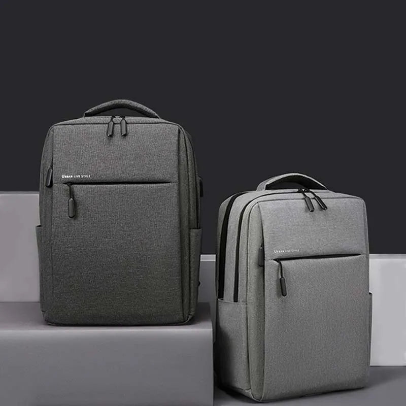 Water-resistant laptop backpack with padded compartment and multiple pockets