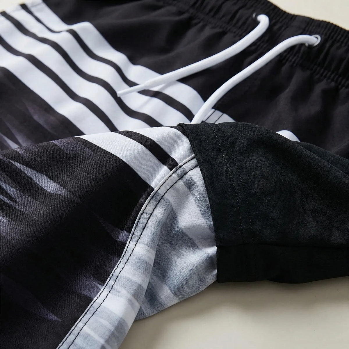 Athletic 2-in-1 swim shorts with inner lining and quick-dry outer layer