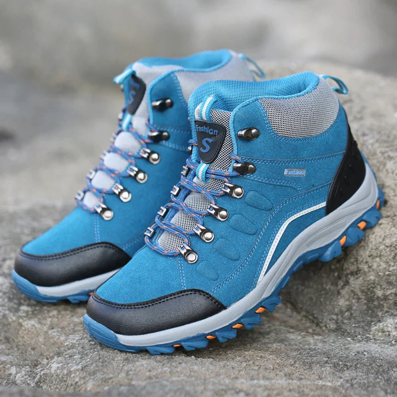 Women's leather hiking boots with ankle support and non-slip traction