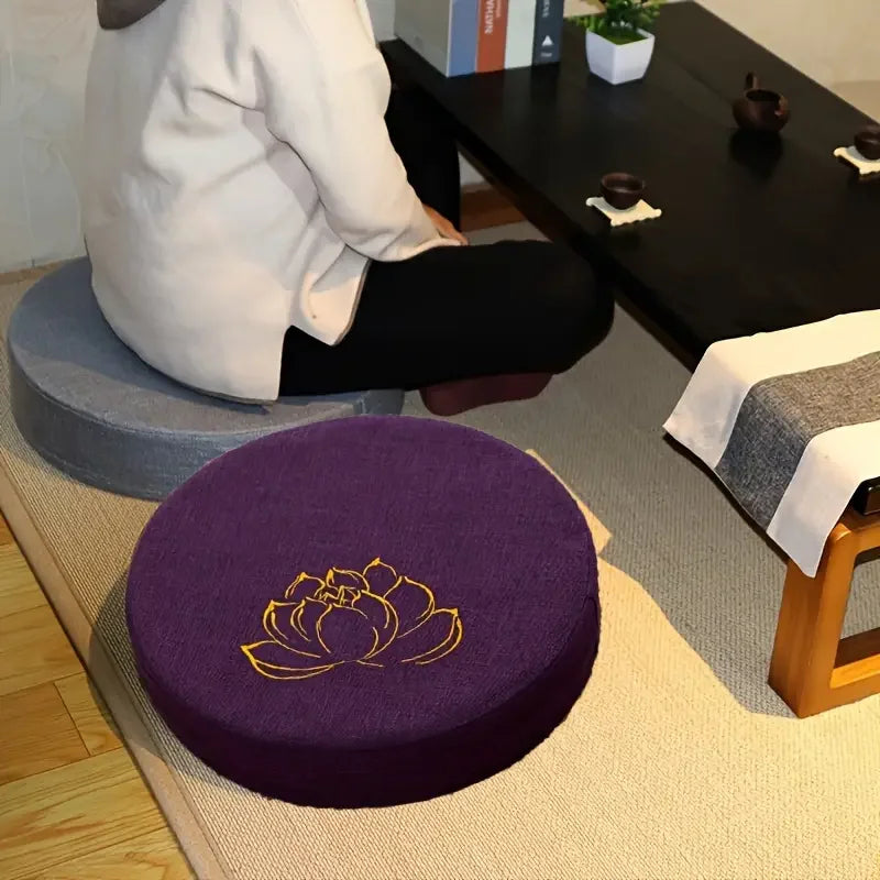 Round firm meditation cushion with non-slip textured cover