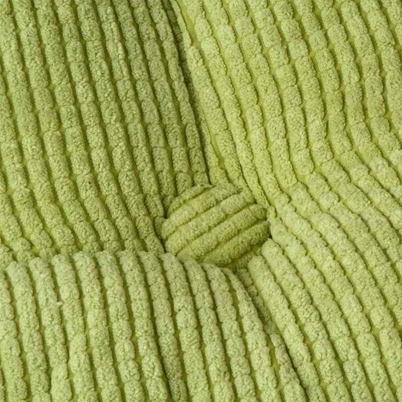 Round tufted floor cushion with plush padding for meditation seating
