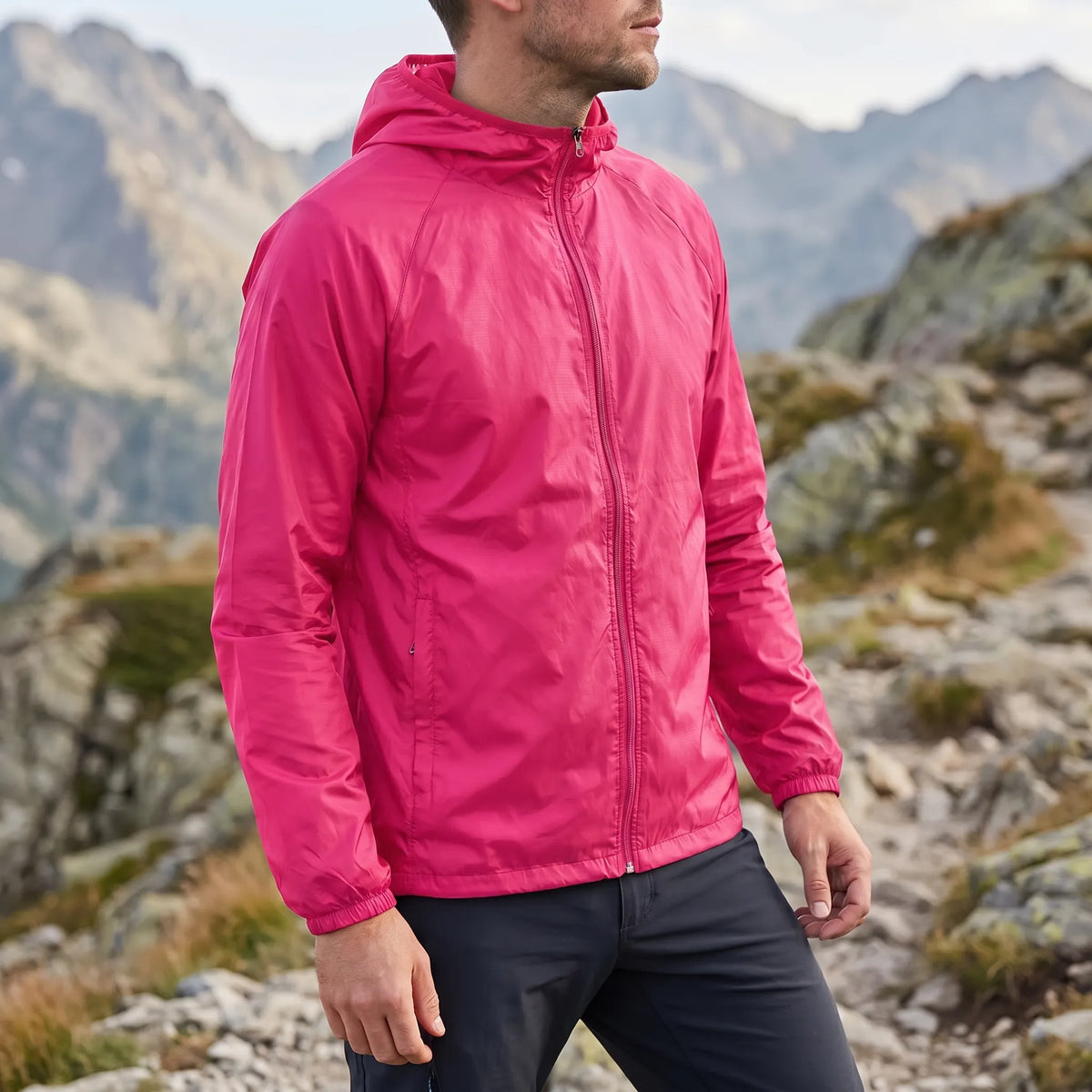 Lightweight packable windbreaker with integrated hood and water-repellent outer