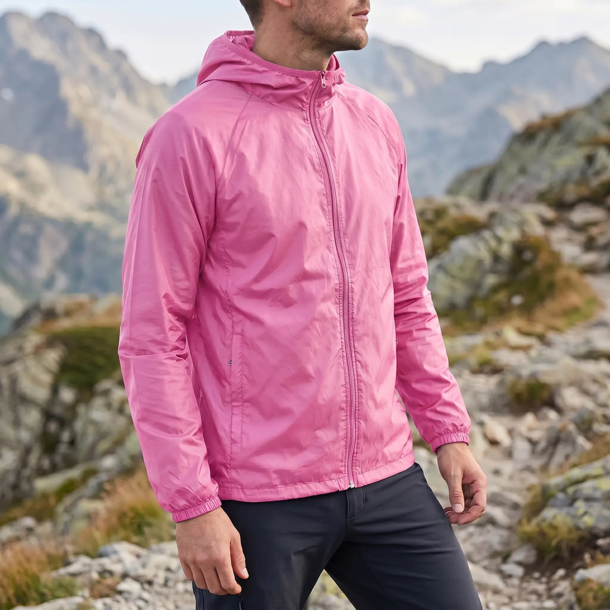 Lightweight packable windbreaker with integrated hood and water-repellent outer