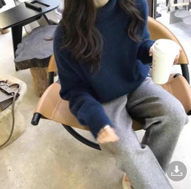 Women's Cashmere Turtleneck Sweater with Wide Cut and Elegant Texture