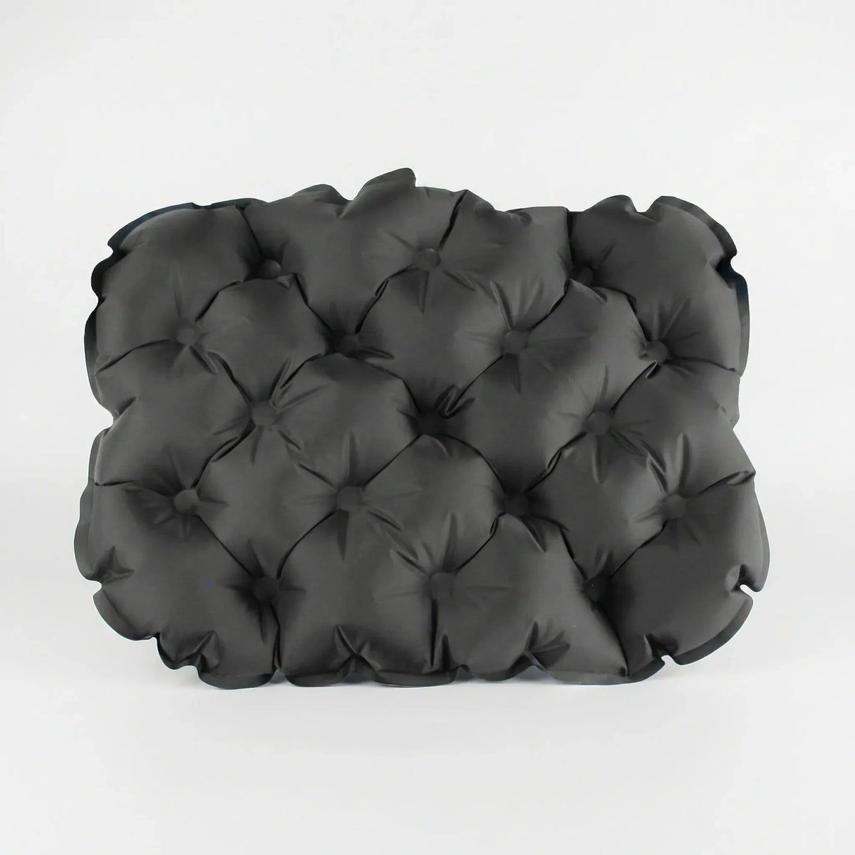 Portable inflatable seat cushion with water-resistant surface