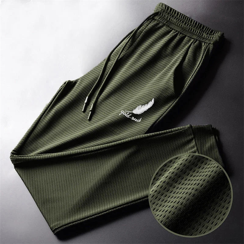 Quick-dry breathable jogging pants with ankle taper and adjustable waistband