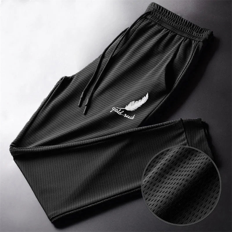 Quick-dry breathable jogging pants with ankle taper and adjustable waistband