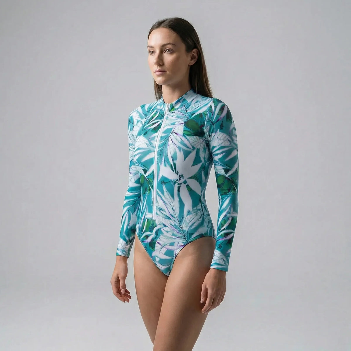 Long sleeve swimsuit with front zip closure and flattering seams