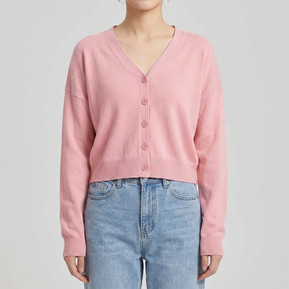 Women's cropped V-neck cardigan with ribbed cuffs and button-down front