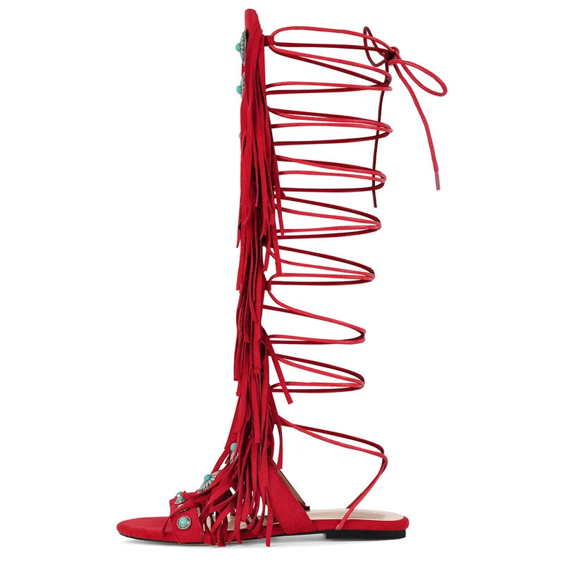 Ankle-high fringe sandals with lace-up closure and metallic stone details