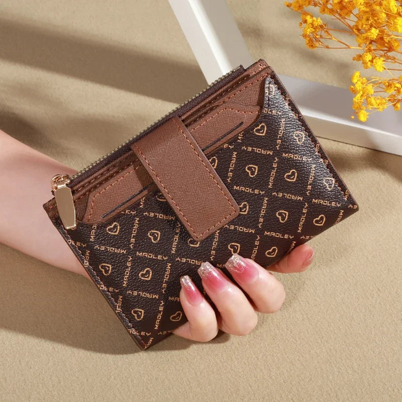 Compact bifold wallet with card slots and zip coin pocket