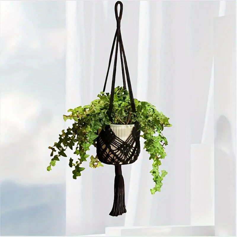 Boho macrame woven plant hanger with geometric knotted design and tassel finish