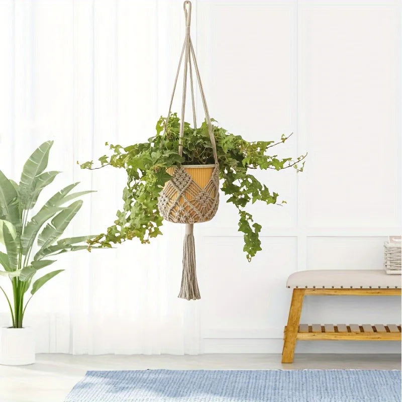 Boho macrame woven plant hanger with geometric knotted design and tassel finish