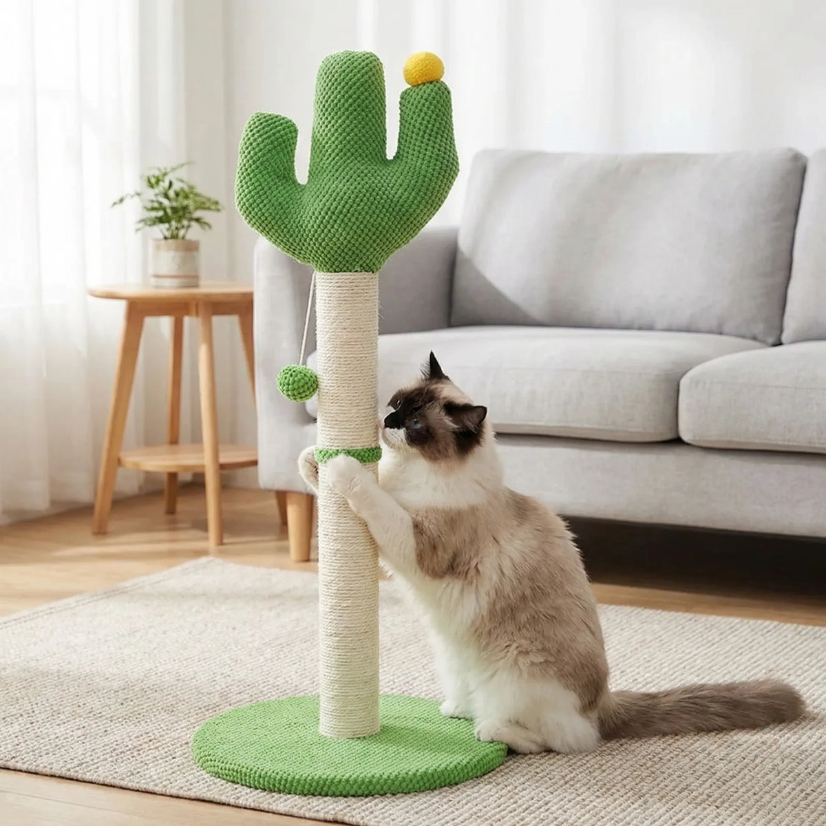 Cactus-shaped cat scratching post with tall rope post and dangling pompom balls