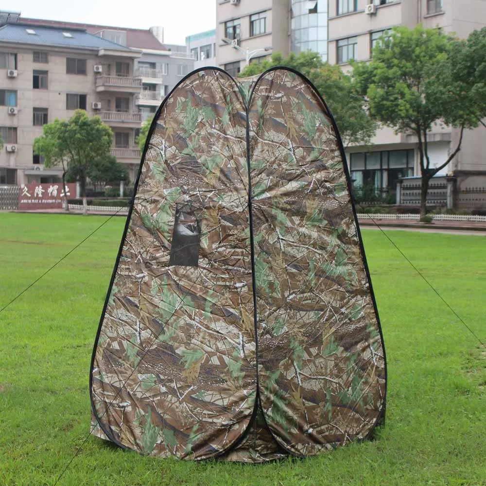 Pop-up privacy tent with ventilated mesh windows and compact carry bag