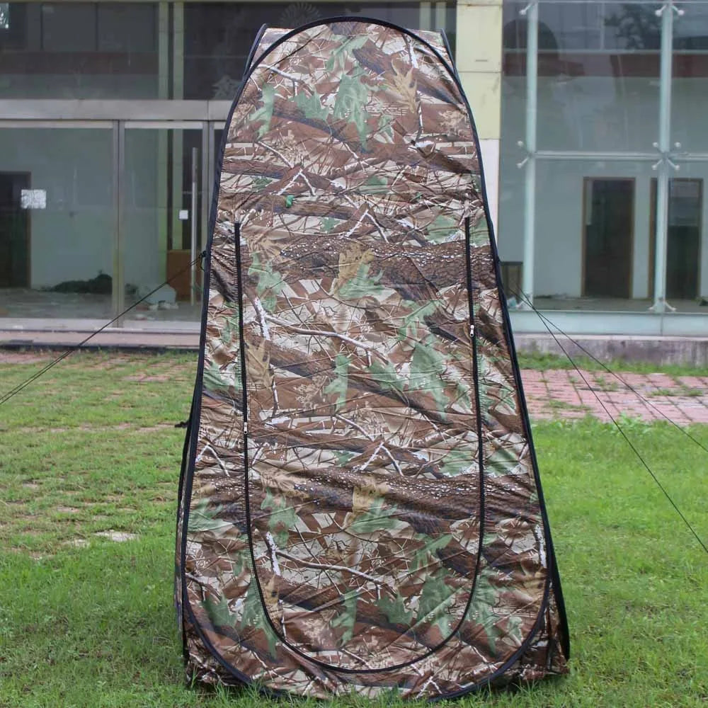 Pop-up privacy tent with ventilated mesh windows and compact carry bag
