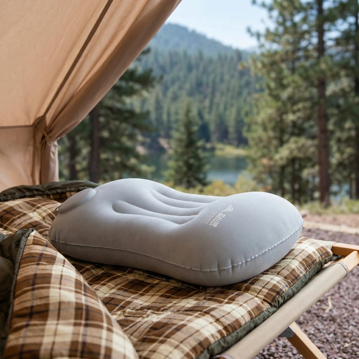 Inflatable camping pillow with contoured neck and lower back support