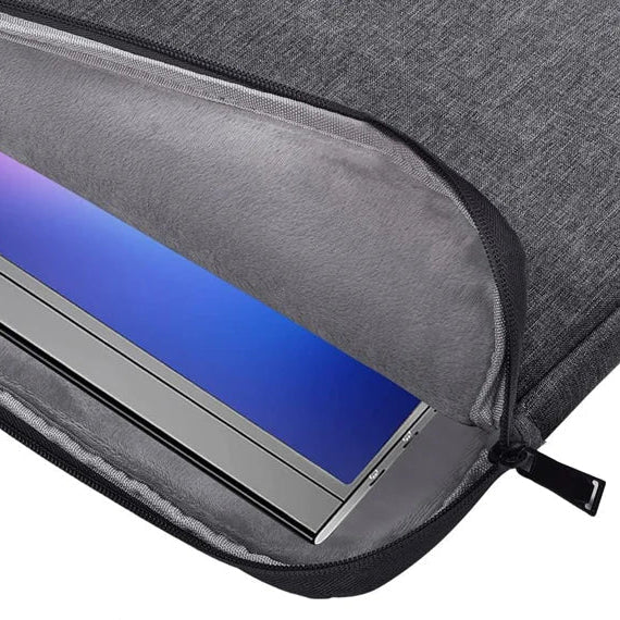 Water-resistant canvas laptop sleeve with padded interior and front pocket