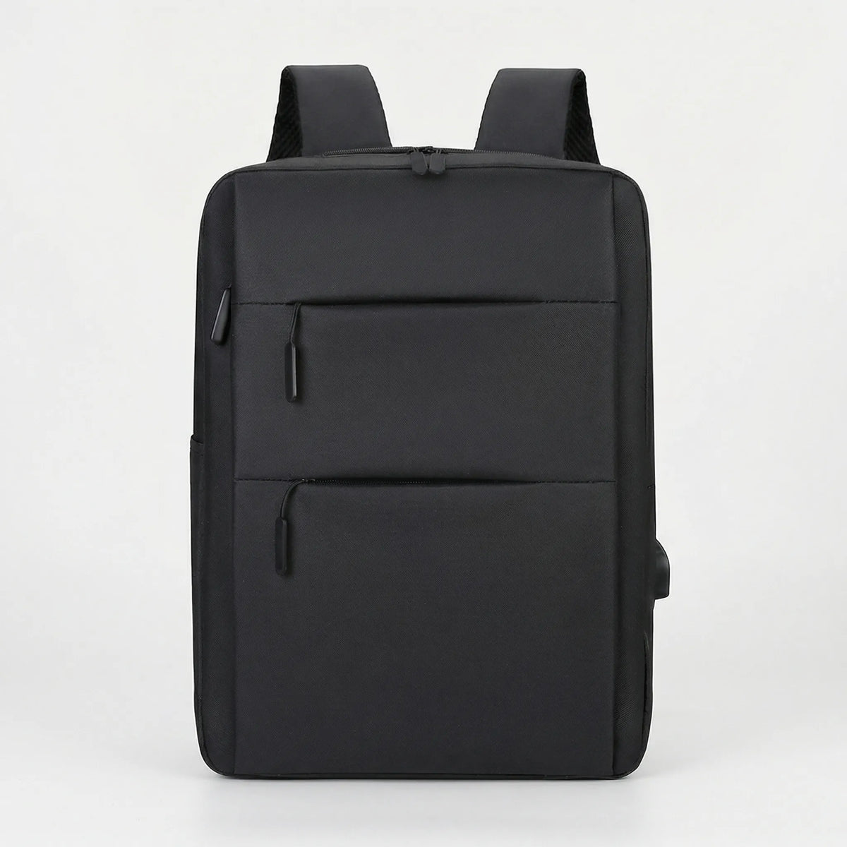 Multi-compartment laptop backpack with USB charging port and padded shoulder straps